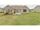 House exterior featuring a large backyard and patio at 333 Carolina Springs Ct., Conway, SC 29527