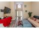 Living room with vaulted ceiling, hardwood floors and view of the entryway at 333 Carolina Springs Ct., Conway, SC 29527