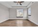 Bright bedroom with hardwood floors and a large window at 891 Waterton Ave., Myrtle Beach, SC 29579