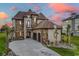 Stunning two-story home with stone accents and a three-car garage at 891 Waterton Ave., Myrtle Beach, SC 29579
