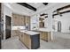 Modern kitchen with island, stainless steel appliances, and wood cabinets at 891 Waterton Ave., Myrtle Beach, SC 29579