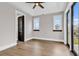 Well-lit bedroom with hardwood floors and access to a balcony at 891 Waterton Ave., Myrtle Beach, SC 29579