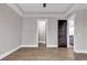 Spacious bedroom featuring hardwood floors and neutral walls at 891 Waterton Ave., Myrtle Beach, SC 29579
