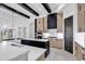 Bright kitchen, features an island, stainless steel appliances, and white quartz countertops at 891 Waterton Ave., Myrtle Beach, SC 29579