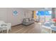 Living room with ocean view, comfortable seating, and dining area at 6900 N Ocean Blvd. # 1040, Myrtle Beach, SC 29572