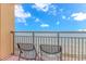Balcony with chairs overlooking the ocean at 6900 N Ocean Blvd. # 1040, Myrtle Beach, SC 29572