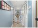 Light and airy hallway with tile flooring, leading to living areas at 5905 S Kings Highway # 210B, Myrtle Beach, SC 29575