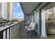 Spacious balcony with ocean view and seating for two at 5905 S Kings Highway # 210B, Myrtle Beach, SC 29575