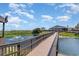 Boardwalk path with fountain and ocean view at 5905 S Kings Highway # 210B, Myrtle Beach, SC 29575