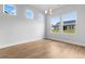 Bright dining area with hardwood floors and large windows at 1112 Nw Forest Bend Dr., Calabash, NC 28467