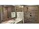 Elegant bathroom featuring a double vanity and a walk-in shower at 1411 Gooseneck Place # 103, Murrells Inlet, SC 29576