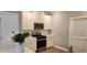 Modern kitchen with stainless steel appliances and white cabinets at 1411 Gooseneck Place # 103, Murrells Inlet, SC 29576