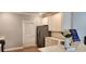 Kitchen with white cabinets and stainless steel appliances at 1411 Gooseneck Place # 103, Murrells Inlet, SC 29576