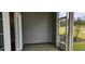Private screened porch with access to backyard at 1411 Gooseneck Place # 103, Murrells Inlet, SC 29576