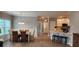 Elegant dining room with a table and chairs near the kitchen at 1411 Gooseneck Place # 103, Murrells Inlet, SC 29576