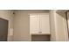 White cabinets in the hallway at 1411 Gooseneck Place # 103, Murrells Inlet, SC 29576