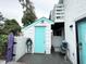 Inviting exterior features a teal door and small patio area at 306 21St Ave. S # 4A, Myrtle Beach, SC 29577