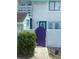 Exterior view of the property with a purple gate and teal accents at 306 21St Ave. S # 4A, Myrtle Beach, SC 29577
