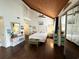 Bright bedroom with a queen bed, hardwood floors, and built-in mirrored closet at 306 21St Ave. S # 4A, Myrtle Beach, SC 29577