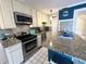 Modern kitchen with stainless steel appliances and granite countertops at 306 21St Ave. S # 4A, Myrtle Beach, SC 29577