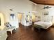 Spacious bedroom with hardwood floors and access to the bathroom and hallway at 306 21St Ave. S # 4A, Myrtle Beach, SC 29577