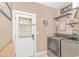 Laundry room with washer, dryer, and exterior access at 3815 Ed Smith Ave., Myrtle Beach, SC 29588