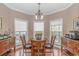Bright dining area with hardwood floors and built-in cabinetry at 3815 Ed Smith Ave., Myrtle Beach, SC 29588