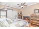 Cozy bedroom featuring a fireplace and barn door at 3815 Ed Smith Ave., Myrtle Beach, SC 29588