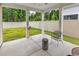 Covered patio with seating area and fenced backyard at 3722 White Wing Circle, Myrtle Beach, SC 29579