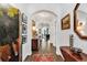 Bright and spacious entryway with hardwood floors, elegant furniture, and beautiful artwork at 3722 White Wing Circle, Myrtle Beach, SC 29579