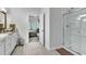 Bathroom with shower and access to the main bedroom at 3722 White Wing Circle, Myrtle Beach, SC 29579