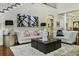 Living room with plush sofas, a coffee table and high ceilings at 616 Edgecreek Dr., Myrtle Beach, SC 29579