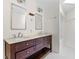 Bathroom with double vanity and marble countertop at 915 Cedarwood Circle, Myrtle Beach, SC 29572