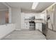Modern kitchen with white cabinets, stainless steel appliances, and granite countertops at 838 Marlin Ct., Murrells Inlet, SC 29576