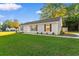 Single story home with gray siding and well-maintained lawn at 3449 Church St., Loris, SC 29569