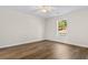 Bright bedroom with large window and wood flooring at 3449 Church St., Loris, SC 29569