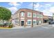Brick commercial building on a corner lot in a town setting at 3449 Church St., Loris, SC 29569