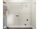 Laundry area with shelving and hookups for washer and dryer at 3449 Church St., Loris, SC 29569