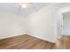 Bedroom featuring hardwood floors and access to a bathroom at 3449 Church St., Loris, SC 29569
