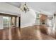 Spacious living area with high ceiling, fireplace, and lots of natural light at 19 South Gate Rd., Myrtle Beach, SC 29572