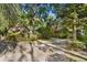 Brick home nestled on a tree-lined lot with a spacious driveway at 19 South Gate Rd., Myrtle Beach, SC 29572