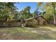 Brick house exterior with landscaped yard and spacious patio at 19 South Gate Rd., Myrtle Beach, SC 29572
