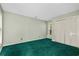 Simple bedroom with green carpet and built-in closet at 19 South Gate Rd., Myrtle Beach, SC 29572