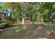 Backyard with storage shed and mature trees at 19 South Gate Rd., Myrtle Beach, SC 29572