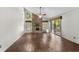 Spacious living area with tile floors, fireplace, and sliding glass doors at 19 South Gate Rd., Myrtle Beach, SC 29572