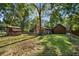 Large backyard with storage shed and chain link fence at 19 South Gate Rd., Myrtle Beach, SC 29572