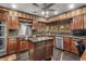 Modern kitchen featuring granite counters, ample cabinetry, and island at 19 South Gate Rd., Myrtle Beach, SC 29572