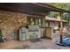 Built-in outdoor kitchen with gas grill and ample counter space at 19 South Gate Rd., Myrtle Beach, SC 29572