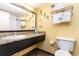 Clean bathroom with granite countertop, toilet, and shower at 1501 S Ocean Blvd. # 330, Myrtle Beach, SC 29577