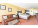 King-size bed, couch, kitchenette and ocean view at 1501 S Ocean Blvd. # 330, Myrtle Beach, SC 29577